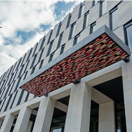 Steigenberger Airport Hotel Berlin Schoenefeld Exterior photo The building of the company