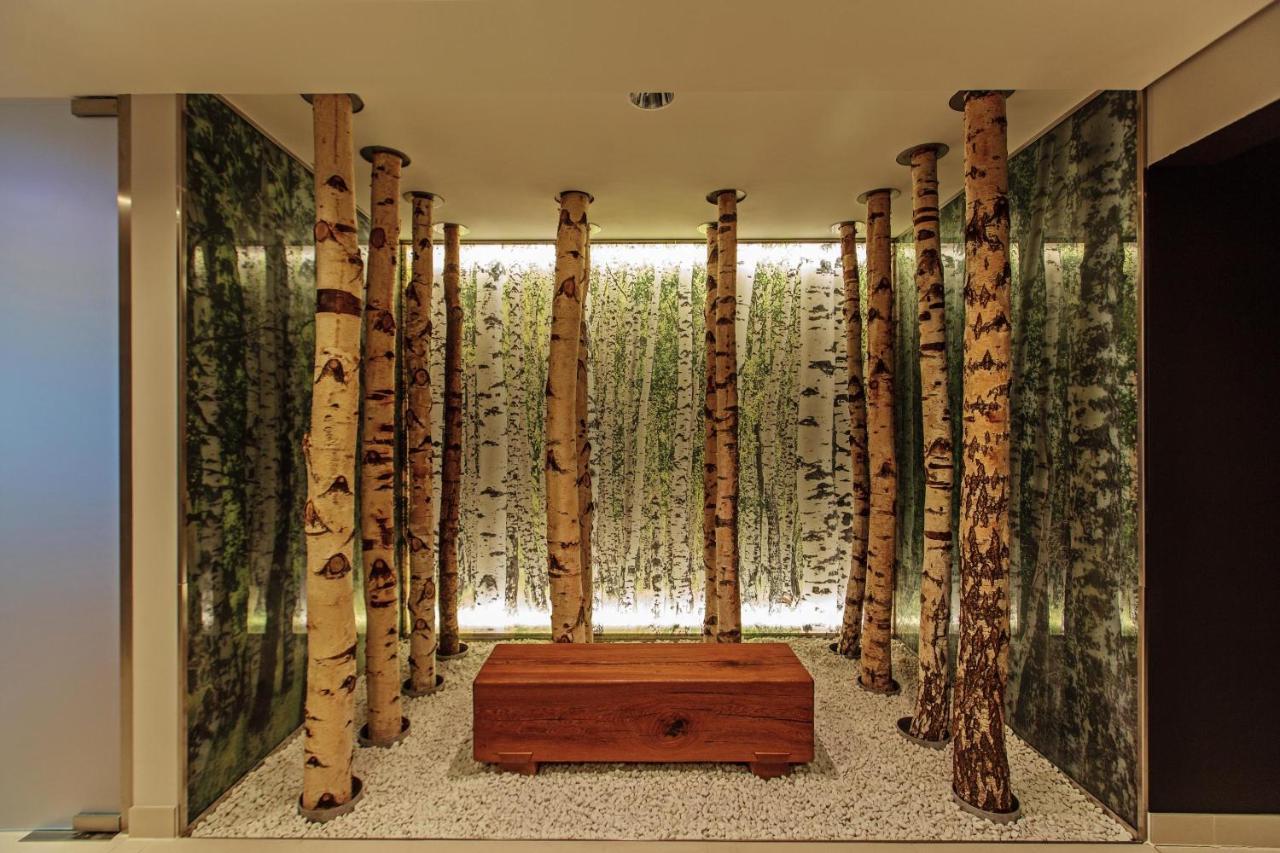Steigenberger Airport Hotel Berlin Schoenefeld Exterior photo "The forest is my home"