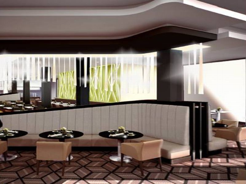 Steigenberger Airport Hotel Berlin Schoenefeld Exterior photo Interior of a modern hotel